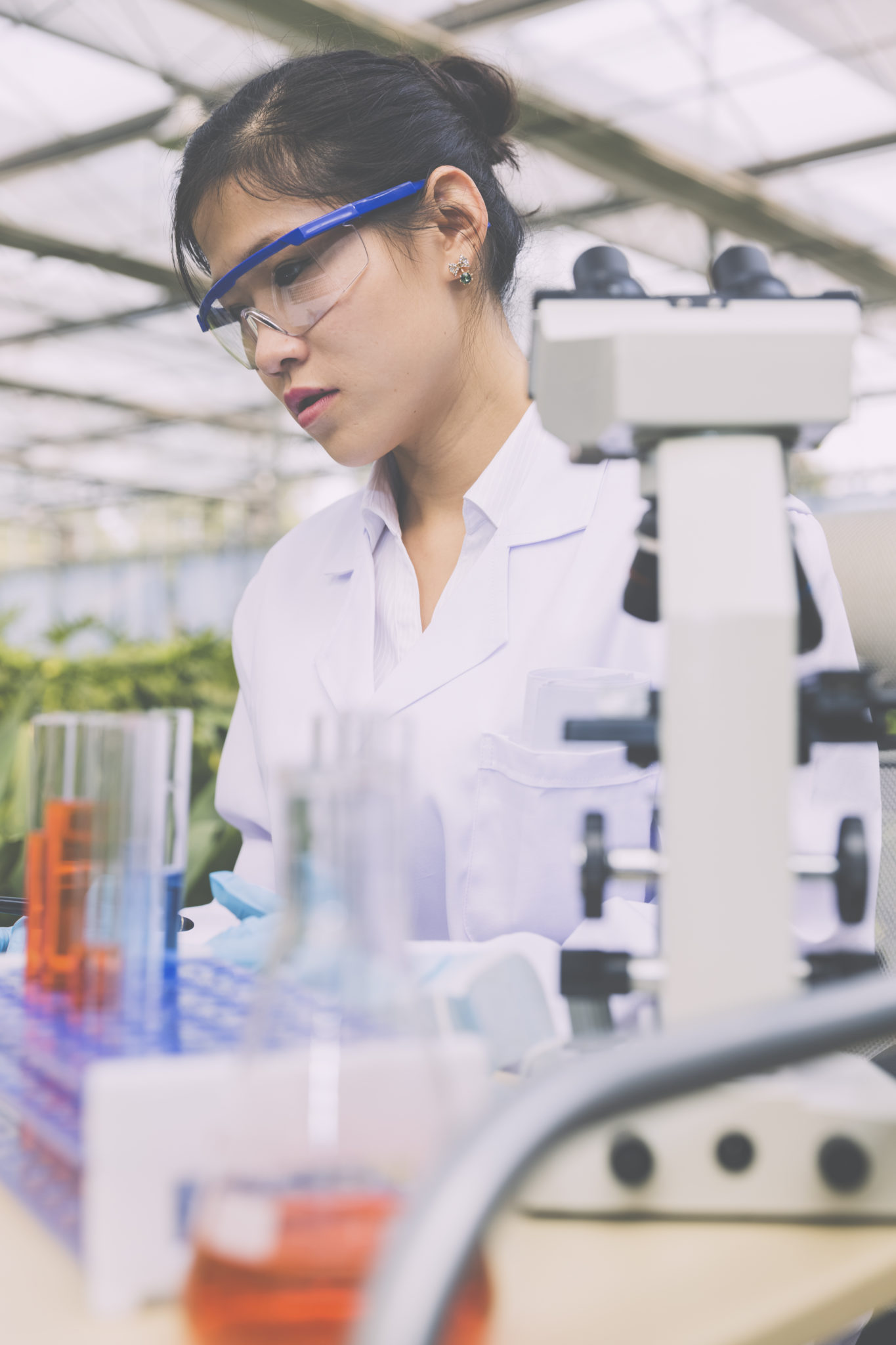 woman scientist with microscope